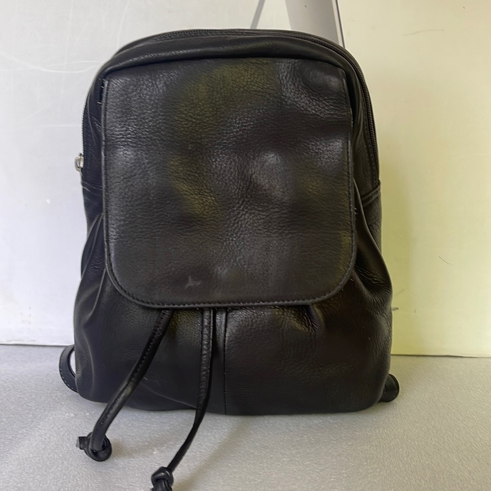 Piel Black leather Drawstring Front Pocket mini backpack